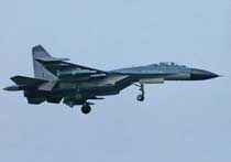 俄称中国歼11B战机换国产动力 飞行员倍感自豪