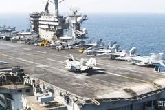 美航母穿越海峡时，大批导弹突然从天而降，能否一举击沉航母？